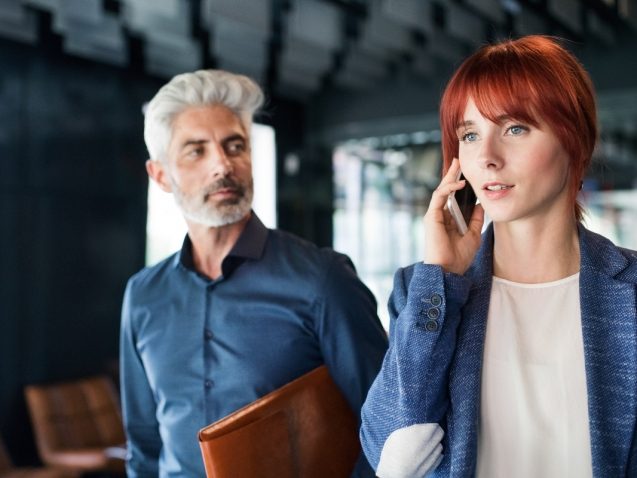 business-people-in-the-office-making-a-phone-call-PQZTHDY